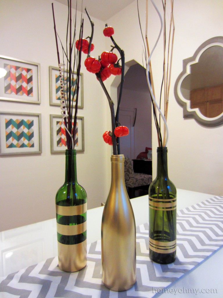 Credit: http://www.homeyohmy.com/diy-spray-painted-wine-bottles/